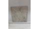 Close up of Laufen USA Ivory tile sample at 126 Goorawing Ln, Mooresville, NC 28115