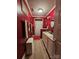 Full bathroom featuring a single sink vanity, and red painted walls and trim at 130 Scism Rd, Kings Mountain, NC 28086