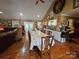 Large dining area with an oversized table, open layout, and easy access to the kitchen at 130 Scism Rd, Kings Mountain, NC 28086
