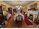 Elegant dining room with a long table and a view into adjoining rooms, bright and inviting at 130 Scism Rd, Kings Mountain, NC 28086