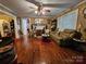 Cozy living room featuring hardwood floors and a decorative fireplace, perfect for relaxing at 130 Scism Rd, Kings Mountain, NC 28086