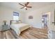 Bedroom features hardwood floors, a ceiling fan, and a window view of the outdoors at 13546 W Highway 55 W Hwy, York, SC 29745