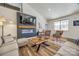 Cozy living room featuring a modern fireplace, comfortable seating, and natural light at 13546 W Highway 55 W Hwy, York, SC 29745