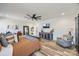 Bright and airy main bedroom with a comfortable bed, modern furnishings, and a large accent chair at 13546 W Highway 55 W Hwy, York, SC 29745