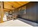 Spacious outdoor patio featuring a dining table, wood columns, and ceiling fan at 13546 W Highway 55 W Hwy, York, SC 29745