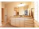 Neutral bathroom features granite counters, tile floors, and a decorative shower curtain at 152 Bay Shore Loop, Mooresville, NC 28117