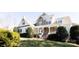 Charming two-story home with stone accents and well-manicured lawn at 152 Bay Shore Loop, Mooresville, NC 28117