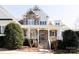 Inviting home entrance with stone steps and wood and stone accents at 152 Bay Shore Loop, Mooresville, NC 28117