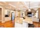 Modern kitchen with granite countertops, stainless steel appliances, and open floor plan at 152 Bay Shore Loop, Mooresville, NC 28117