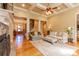Cozy living room with hardwood floors, fireplace, and comfortable seating at 152 Bay Shore Loop, Mooresville, NC 28117