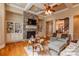 Inviting living room featuring a stone fireplace and built-in shelving at 152 Bay Shore Loop, Mooresville, NC 28117
