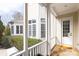 Cozy screened porch featuring stone floors and lots of natural light at 152 Bay Shore Loop, Mooresville, NC 28117