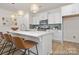 Stylish kitchen with a large island, quartz countertops, stainless steel appliances, and pendant lights at 159 Mooring Dr # 342Pp, Statesville, NC 28677