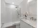 Bathroom with modern gray marble tile, white marble sink, white commode and a glass door shower at 1612 Beleek Ridge Ln, Clover, SC 29710