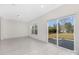 Bright living area with sliding glass doors leading to outdoor space and ample natural light at 1612 Beleek Ridge Ln, Clover, SC 29710