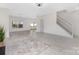 Bright and spacious living room with light wood floors, neutral walls, and ample natural light at 1612 Beleek Ridge Ln, Clover, SC 29710