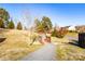 Community walking path with a wooden bridge and manicured landscaping at 1612 Beleek Ridge Ln, Clover, SC 29710