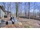 Spacious backyard with patio furniture, offering a serene outdoor living space at 1756 Wellington Ave, Newton, NC 28658