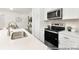 Modern kitchen featuring stainless steel oven and microwave with white cabinetry at 200 J.P. Dr # 184P, Albemarle, NC 28001