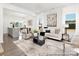 Open-concept living room featuring hardwood floors and plenty of natural light at 200 J.P. Dr # 184P, Albemarle, NC 28001