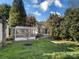 Backyard with a shed and mature trees at 2009 Whippoorwill Ln, Indian Trail, NC 28079