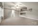 Bonus room with bed nook, ceiling fan and an air conditioning unit at 2009 Whippoorwill Ln, Indian Trail, NC 28079