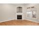 Cozy living room featuring a fireplace and hardwood floors at 2009 Whippoorwill Ln, Indian Trail, NC 28079
