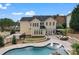 Beautiful backyard with pool, patio, and plenty of room for entertaining at 204 Silvercliff Dr, Mount Holly, NC 28120