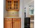 Butler's pantry area with wooden cabinets and ample counter space for serving at 204 Silvercliff Dr, Mount Holly, NC 28120