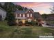 Lovely brick home with manicured lawn and tasteful landscaping at 204 Silvercliff Dr, Mount Holly, NC 28120