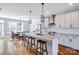 Open kitchen featuring a large island, stainless steel appliances, and ample cabinets at 2123 Isom St, Charlotte, NC 28208