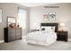 Inviting bedroom with warm-toned walls, comfortable bed, and stylish decor at 221 Basildon St # 1019, Lancaster, SC 29720