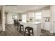 Bright kitchen with white cabinets, a large island, and stainless steel sink at 221 Basildon St # 1019, Lancaster, SC 29720