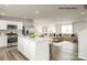 Open-concept kitchen and living room featuring modern appliances and stylish furnishings at 221 Basildon St # 1019, Lancaster, SC 29720
