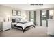 Elegant main bedroom with soft lighting, plush carpeting, and large windows at 221 Basildon St # 1019, Lancaster, SC 29720