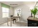 Cozy home office with a classic wooden desk and a comfortable chair at 221 Basildon St # 1019, Lancaster, SC 29720