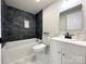 Bathroom with black marble tile accent, and a modern vanity at 226 Malvern Sw Dr, Concord, NC 28025