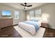 Bright bedroom features hardwood floors, ceiling fan, and is virtually staged at 226 Malvern Sw Dr, Concord, NC 28025