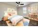 Bedroom virtually staged with colorful décor and lots of light at 226 Malvern Sw Dr, Concord, NC 28025