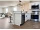 Contemporary kitchen with stainless steel appliances, white cabinets, and subway tile backsplash at 226 Malvern Sw Dr, Concord, NC 28025