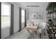 Cozy home office with natural light and a stylish desk and bookshelf at 227 Basildon St # 1020, Lancaster, SC 29720