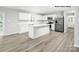 Modern kitchen with white cabinetry, stainless steel appliances, and a spacious center island at 227 Basildon St # 1020, Lancaster, SC 29720