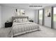 Relaxing main bedroom with a comfortable bed, side tables, and natural light at 227 Basildon St # 1020, Lancaster, SC 29720