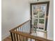 Hallway with a modern chandelier and a window offering natural light at 229 N Canterbury Rd, Charlotte, NC 28211