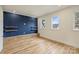 Bright playroom featuring built-in storage, open shelving, and natural light at 229 N Canterbury Rd, Charlotte, NC 28211