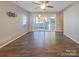 Bright and spacious living room with hardwood floors and sliding glass doors to the backyard at 23186 Goose Down Ln, Lancaster, SC 29720