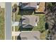 An aerial view of a home with a backyard deck, a fire pit, and a small in-ground pool at 2352 Seagull Dr, Denver, NC 28037