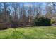 Beautiful backyard offers a serene setting with privacy fence and lush greenery at 2352 Seagull Dr, Denver, NC 28037