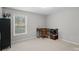 Bedroom featuring a desk, chair, and a window allowing for plenty of natural light at 2352 Seagull Dr, Denver, NC 28037