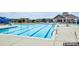 Large community pool with a slide, plenty of seating, and a clubhouse nearby at 2352 Seagull Dr, Denver, NC 28037